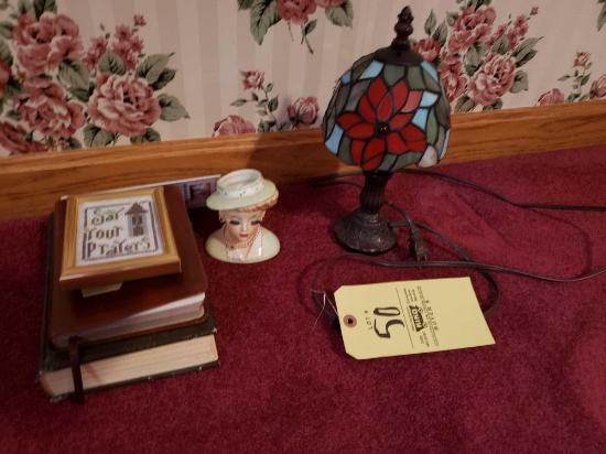 Lamp, bust, books