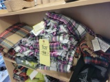 Shelf of ladies blanket scarves