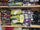 Shelf of ladies blanket scarves