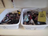 2 small totes of lip gloss, eye shadow and assorted makeup