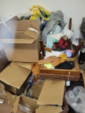Boxes of clothing, linens, broken bench