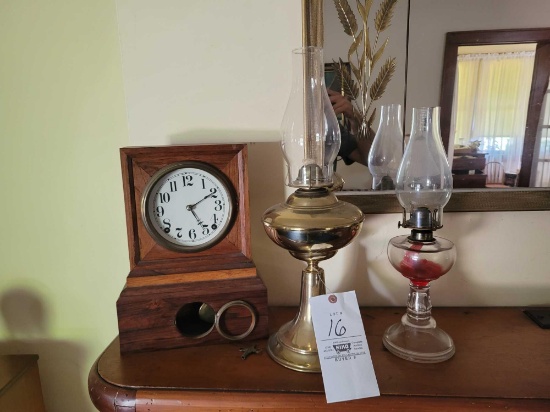 Forestville mfg clock with key and pendulum (missing glass for pendulum door), pair of oil lamps