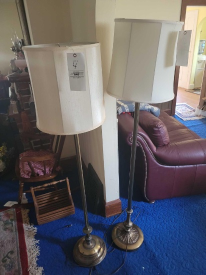 Pair of brass finish floor lamps