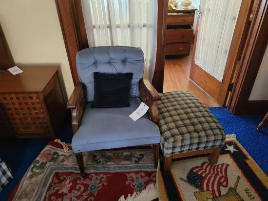 Cane and upholstered arm chair and footstool