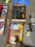 Extension cords, tarp, pipe wrench, radio