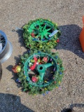 Pair of rims made into Christmas wreaths