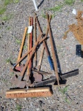 Tools, axes, brooms, scrapper, pick axe