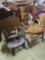 Hip hugger cane-bottom chair and antique child's wood rocking chair