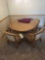 Drexel game table with 4 hip hugger chairs on casters and extra leaf