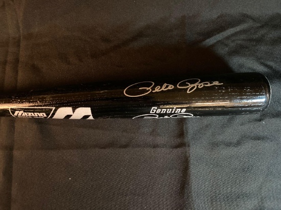 Pete Rose autographed 34" bat. Has COA.