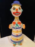 Italy pottery clown wine bottle.
