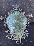Ornate floral shaped metal wall stand w/ gated mirror.