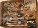 Costume jewelry, old flatware.