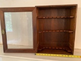 Old utensil cabinet w/ glass door.