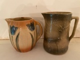 (2) Pottery pitchers incl. stag scene & tulip decorated.