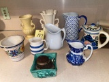 Ceramic ware, pitchers, vases.