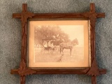 Cut log framed photo, 15 x 13 frame size.