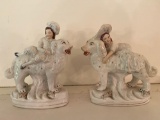 Pair of Staffordshire boy & girl figures, 9