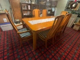 Oak dining room table with 6 chairs and two leaves