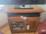 Modern 2 door tv stand, 32 inches tall, (contents not included)