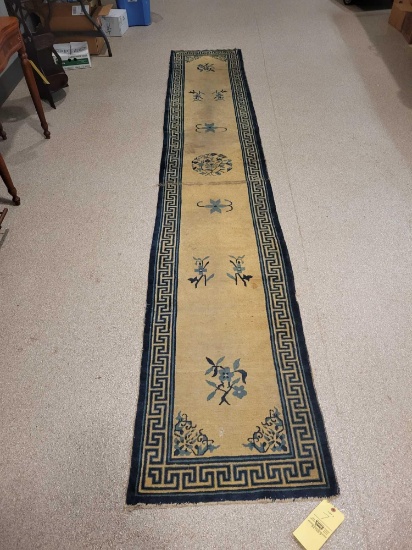 Oriental style handmade runner rug, patched and stitched