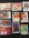 (10) Autographed football cards. Some w/ jersey swatches. Bid times ten.