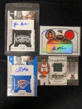 (4) Autographed swatch basketball cards. Bid times four.