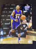 Kobe Bryant signed 8 x 10 photo w/ COA.