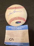 Joe Torre signed baseball w/COA.