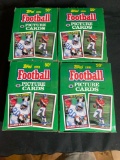 (4) Boxes 1991 Topps football cards w/ (36) unopened wax packs per box.