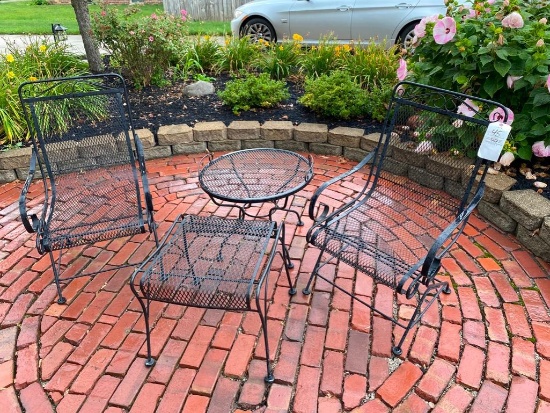 Black wrought iron 4-pc. Patio set, 2 chairs, ottoman, & side table