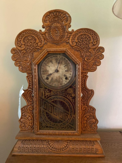 Early ornate carved calendar clock