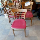 12 red upholstered wooden chairs