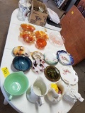 Carnival glass, pitchers, plastic patio table