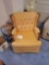 Yellow upholstered wood framed swivel chair