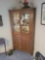 Oak one piece corner cupboard with 2 glass doors, (contents not included)