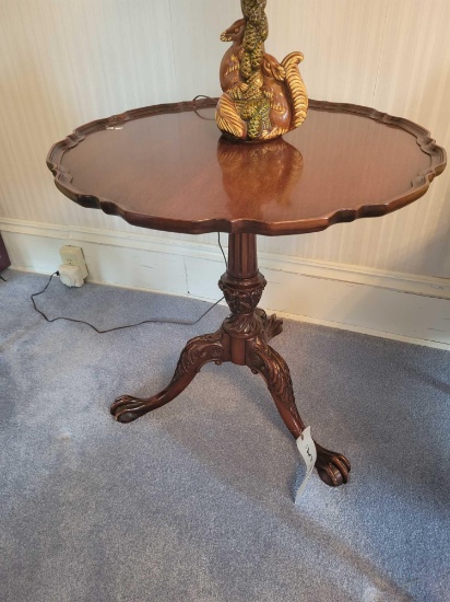 Pie crust top lamp table with carved base