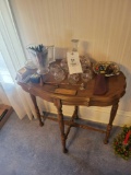 Side table with decanter set, pitcher, glassware, ruler