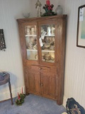 Oak one piece corner cupboard with 2 glass doors, (contents not included)