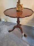 Pie crust top lamp table with carved base