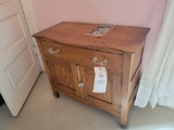 Curve front oak washstand with 2 doors and one drawer, glass pulls