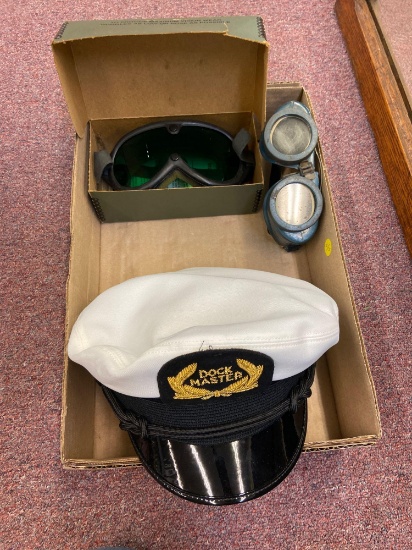 Sailor's hat, two pairs of goggles