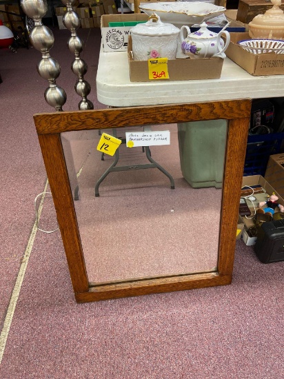 1800s solid oak barbershop mirror, hangs on the wall