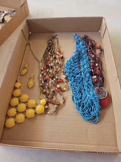 Box of costume jewelry necklaces
