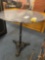 Nice cast iron base table with stone top