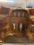 Barrel shaped hanging bar- with glasses, mixers etc