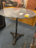 Nice cast iron base table with stone top