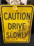 Caution Drive Slowly Metal Sign