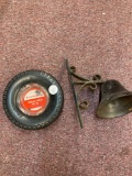 Cast-iron wall mount bell and firestone tire ashtray