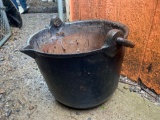 Cast iron kettle with handle and spout